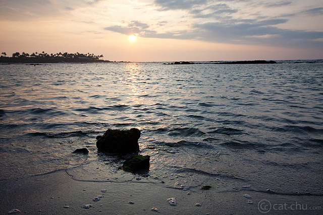Big Island, HI. A low horizon would have put more focus on the sky. A high horizon, like pictured, puts more focus on the water and uses the beach as a stability anchor at the bottom.